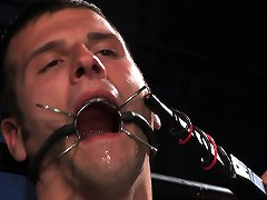 Two comic heroes studs fight and fuck in bondage.